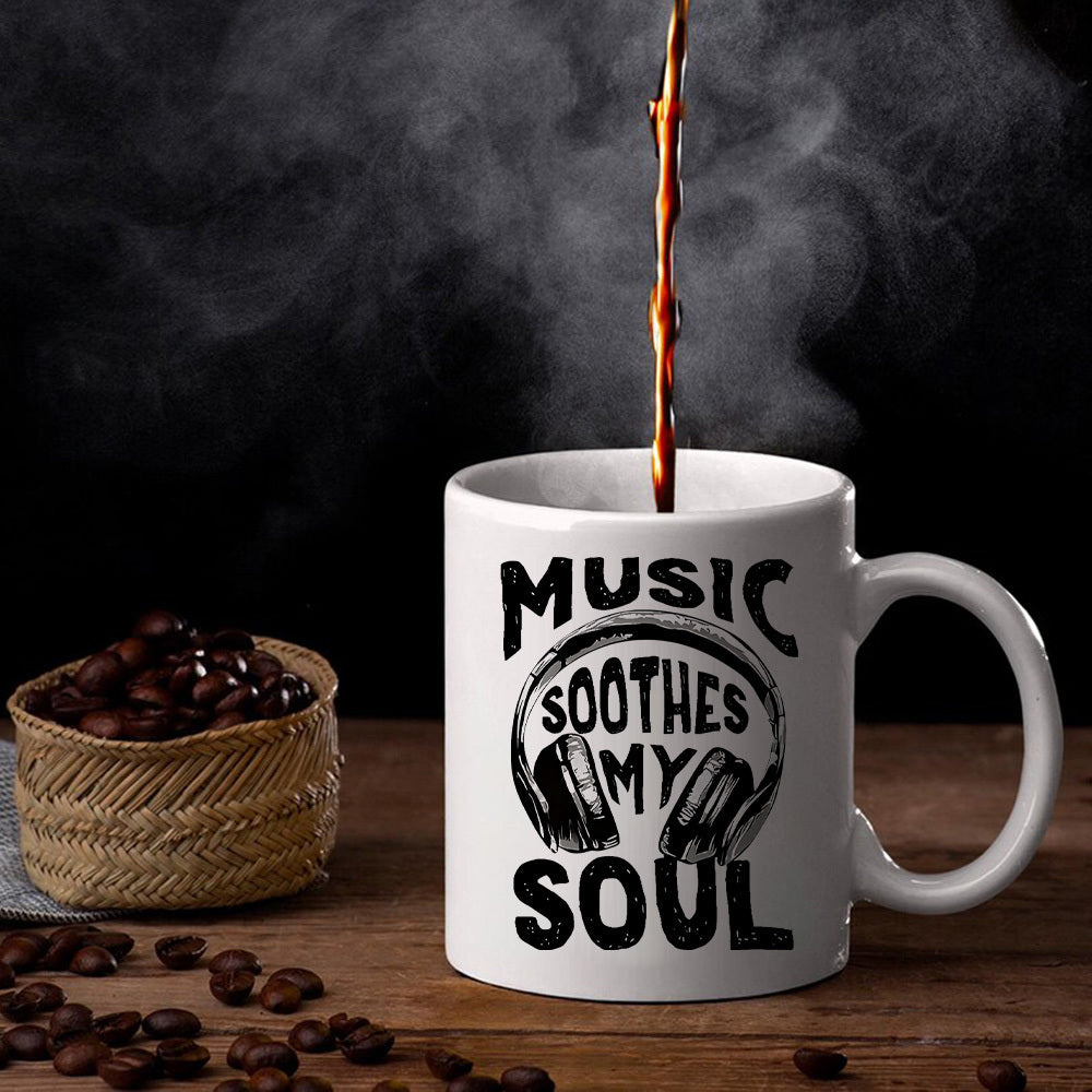 Tailorly White Ceramic 11 oz Mug - Music Soothes My Soul Minimalist Headphones With Steam And Coffee Beans On Wooden Table Mug