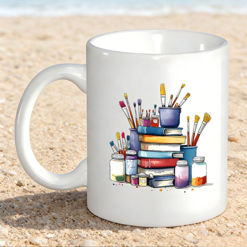 Tailorly White Ceramic 11 oz Mug - Colorful Watercolor Brushes In Jars Resting On A Stack Of Books