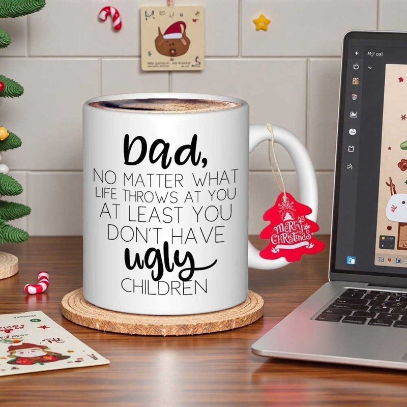 Tailorly White Ceramic 11 oz Mug - Dad No Matter What Life Throws At You At Least You Don't Have Ugly Children Minimalist White Ceramic Vessel Resting On A Simple