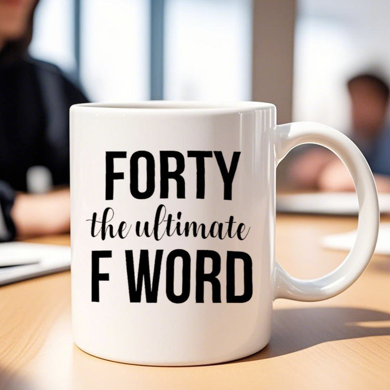 Tailorly White Ceramic 11 oz Mug - Forty The Ultimate F Word Minimalistic Ceramic Piece Resting On A Smooth Light Wood Grain Surface Mug