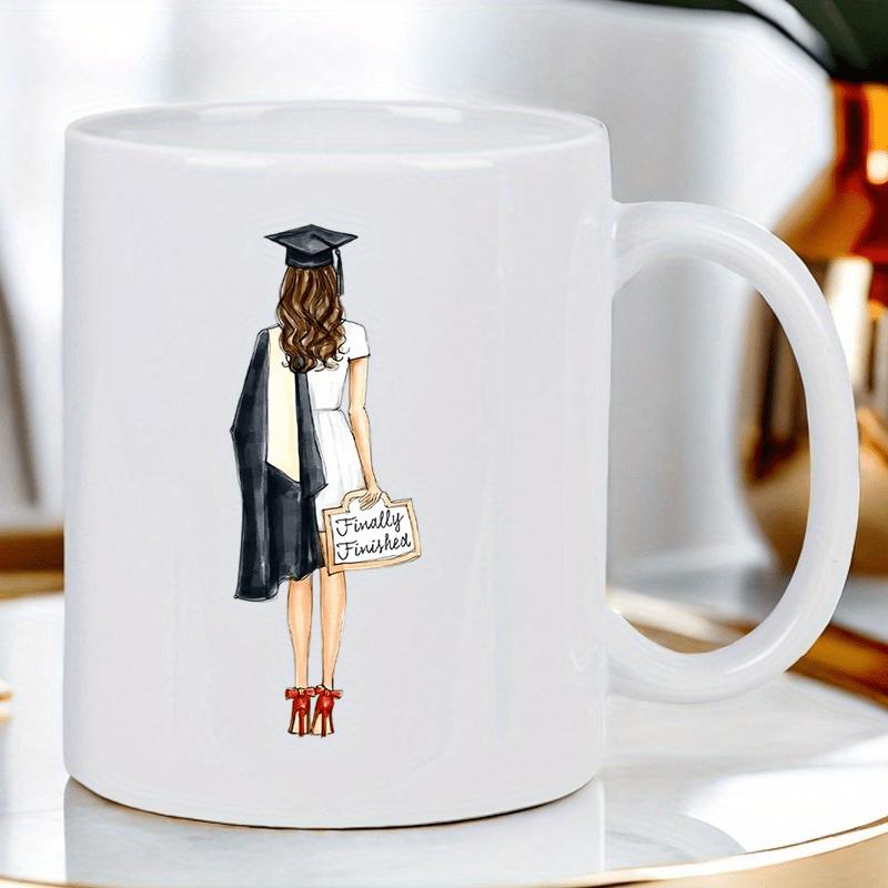 Tailorly White Ceramic 11 oz Mug - Finally Finished Elegant Female Wearing Academic Gown Standing Gracefully Holding Sign Graduate