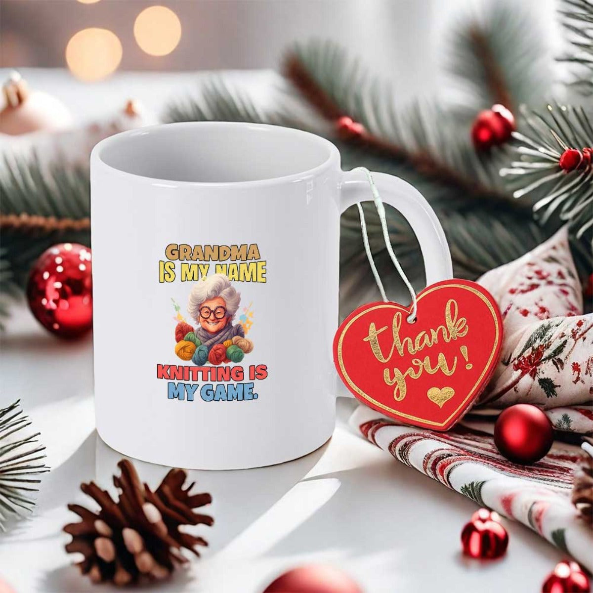 Tailorly White Ceramic 11 oz Mug - Grandma Is My Name Knitting Is My Game Grandmother Knitting With Colorful Yarn Balls In A Cozy Cartoon Style Mug