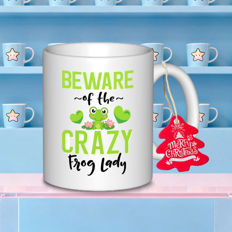 Tailorly White Ceramic 11 oz Mug - Beware Of The Crazy Frog Lady Cute Little Green Frog Sitting On Lotus Pads Among Hearts Frog