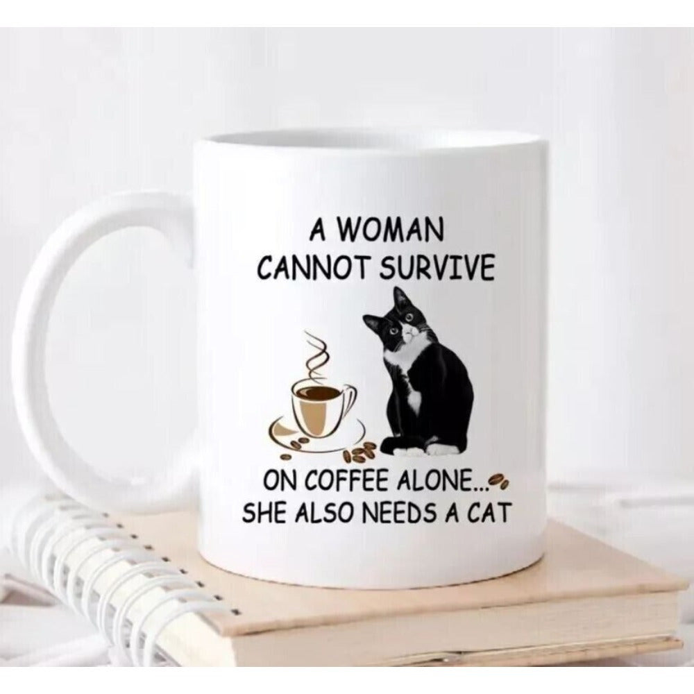 Tailorly White Ceramic 11 oz Mug - A Woman Cannot Survive On Coffee Alone She Also Needs A Cat Charming Tuxedo Feline Sitting Beside Steaming Morning Coffee Cup