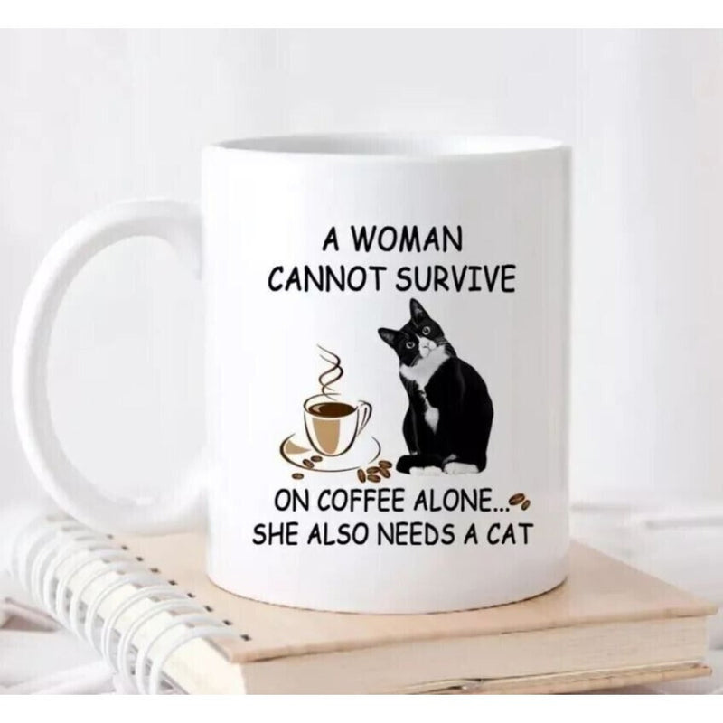 Tailorly White Ceramic 11 oz Mug - A Woman Cannot Survive On Coffee Alone She Also Needs A Cat Charming Tuxedo Feline Sitting Beside Steaming Morning Coffee Cup