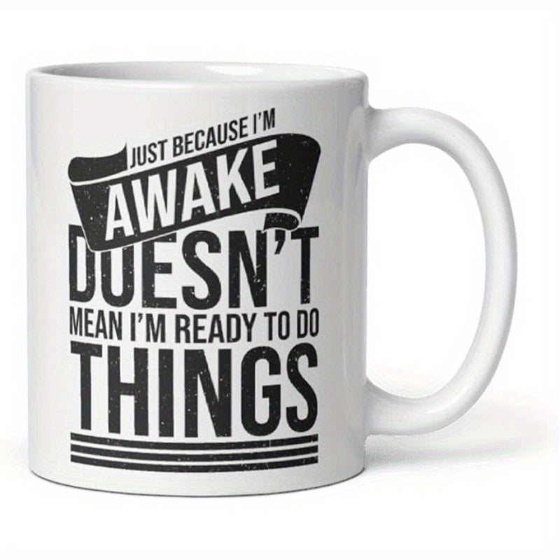 Tailorly White Ceramic 11 oz Mug - Just Because I'm Awake Doesn't Mean I'm Ready To Do Things Bold Distressed Lettering Arranged Inside A Decorative Ribbon And