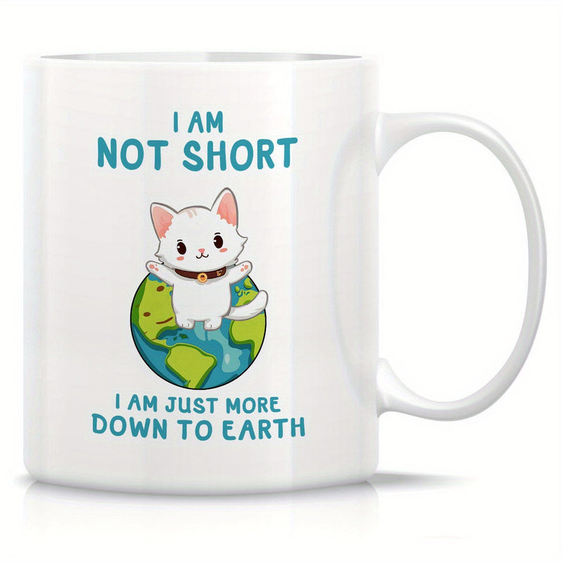 Tailorly White Ceramic 11 oz Mug - I Am Not Short I Am Just More Down To Earth Playful White Kitten Standing Atop A Tiny Vibrant Planet Earth Cat