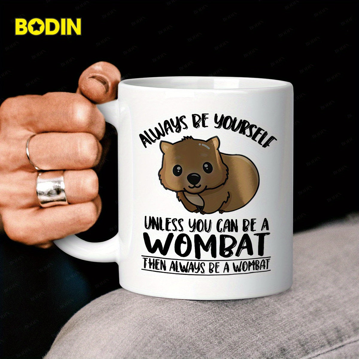 Tailorly White Ceramic 11 oz Mug - Always Be Yourself Unless You Can Be A Wombat Then Always Be A Wombat Adorable Brown Cartoon Animal Sitting Calmly Among Playful