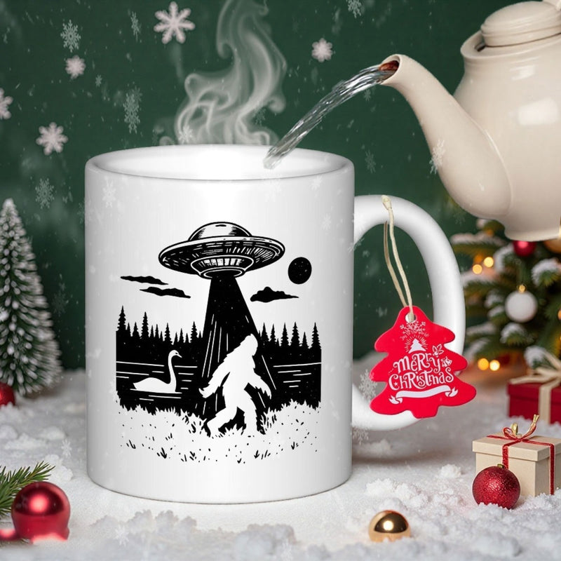 Tailorly White Ceramic 11 oz Mug - Extraterrestrial Flying Saucer Abducting A Mythical Forest Ape Near A Serene Lake Sasquatch