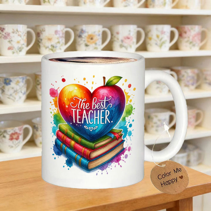 Tailorly White Ceramic 11 oz Mug - The Best Teacher Vibrant Rainbow Heart Shaped Apple Resting On Colorful Stacked Books Watercolor Splash Apple