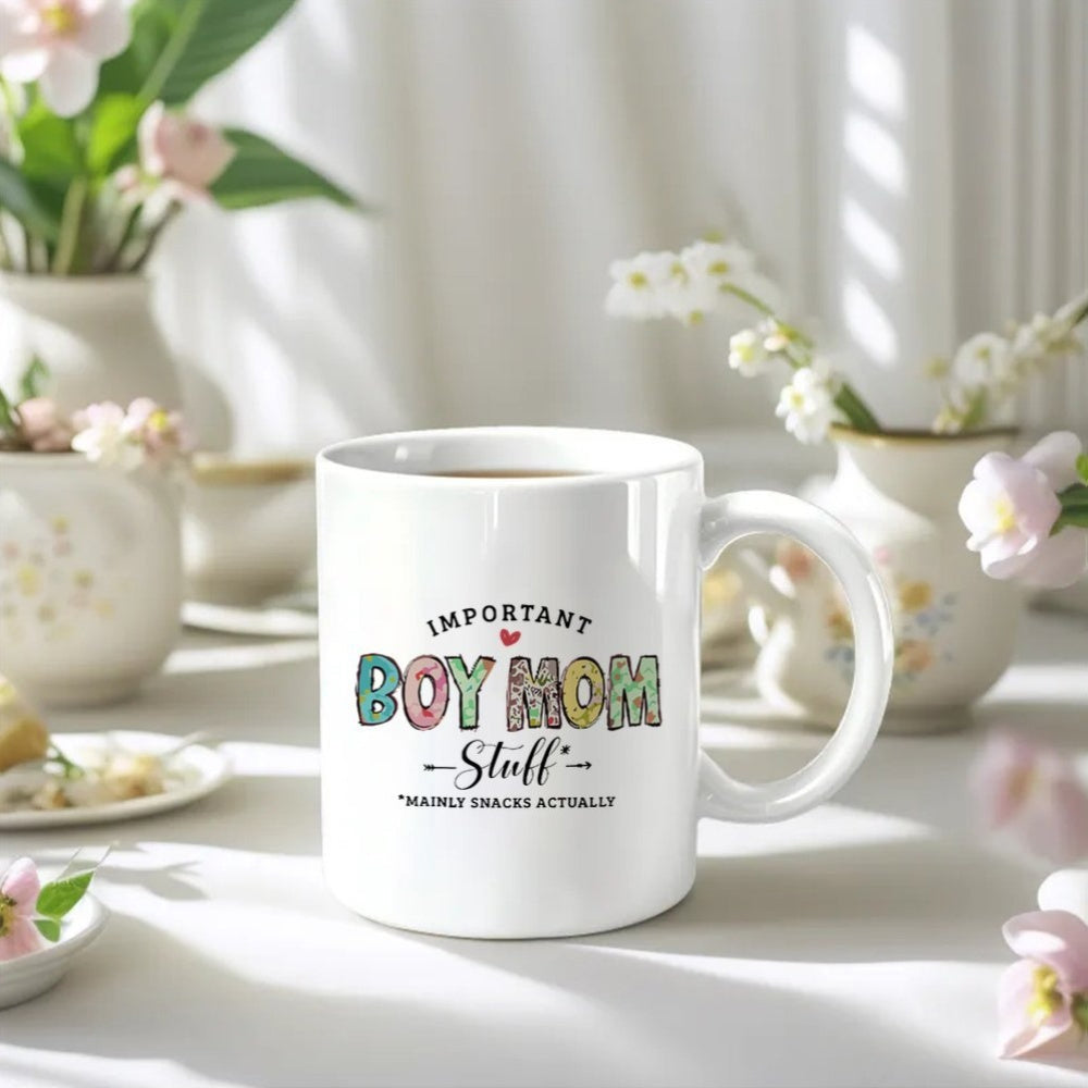 Tailorly White Ceramic 11 oz Mug - Important Boy Mom Staff Mostly Snacks Actually Colorful Patterned Letters With Script Font And Small Heart Details Mug