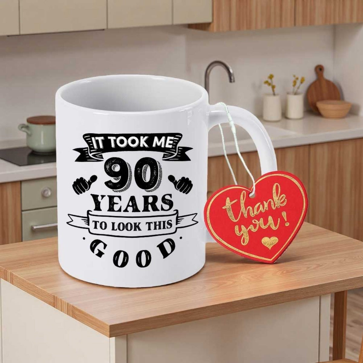 Tailorly White Ceramic 11 oz Mug - It Took Me 90 Years To Look This Good Vintage Style Typography With Decorative Ribbons On A Minimalist White Surface Mug