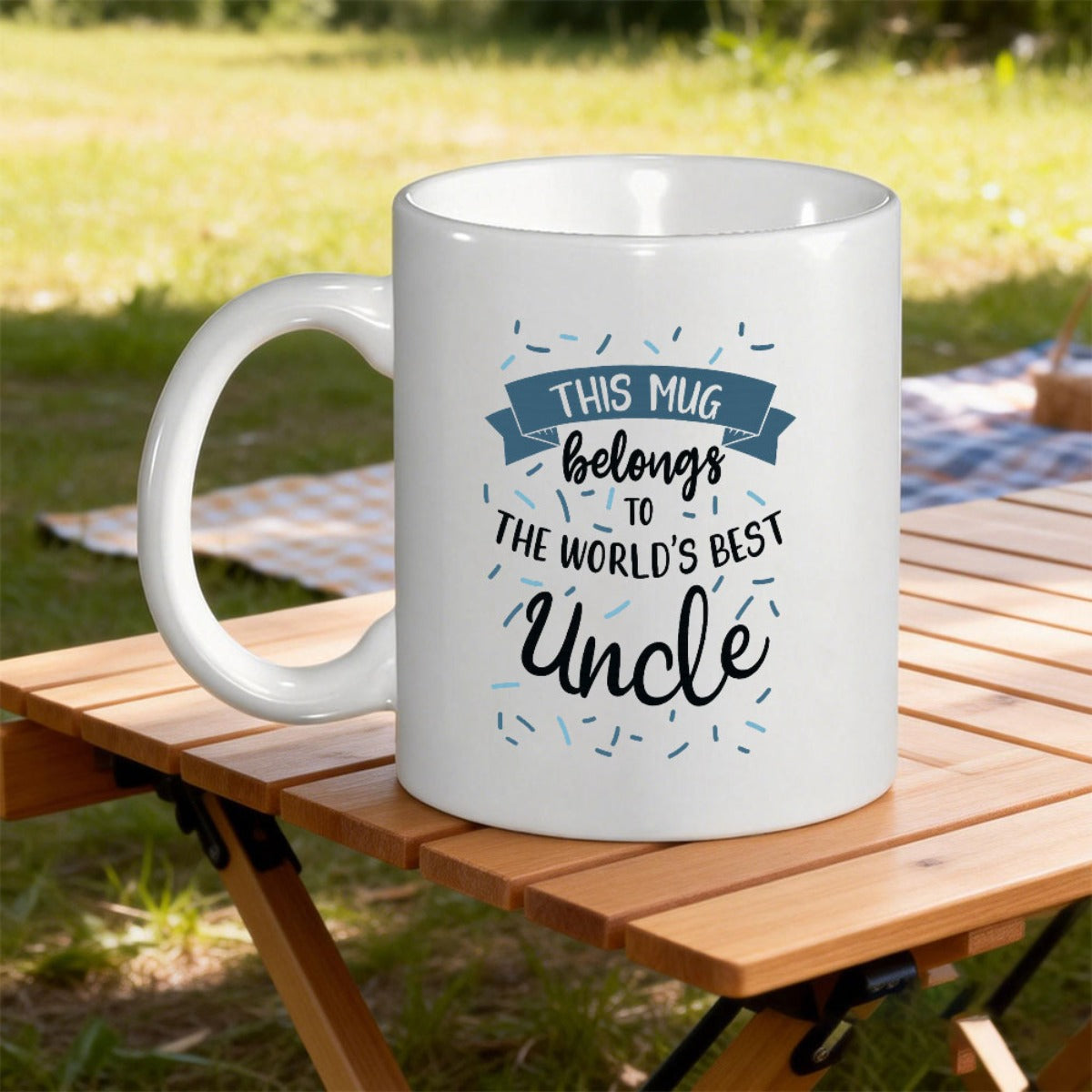 Tailorly White Ceramic 11 oz Mug - This Mug Belongs To The World's Best Uncle Classic Blue Banner Ornamented With Decorative Confetti And Elegant Script Lettering