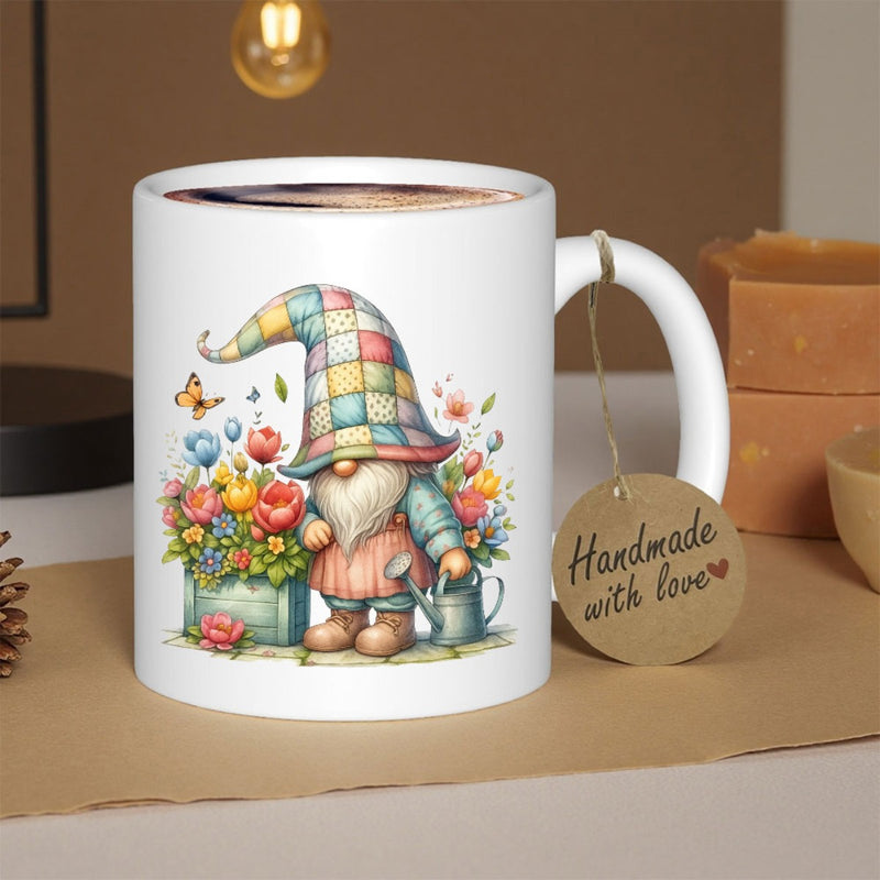 Tailorly White Ceramic 11 oz Mug - Handmade With Love Colorful Patchwork Hat Standing Among Blooming Spring Flowers And Garden Watering Can Gnome