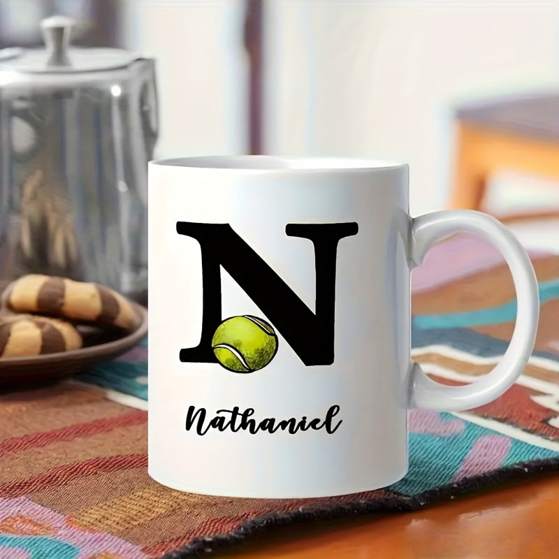 Tailorly White Ceramic 11 oz Mug - Nathaniel Bold Black Capital Letter With Realistic Vibrant Yellow Textured Athletic Tennis Ball Mug