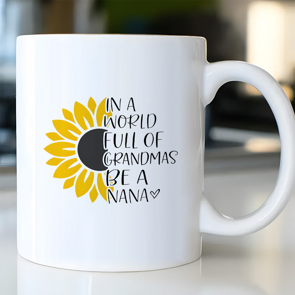 Tailorly White Ceramic 11 oz Mug - In A World Full Of Grandmas Be A Nana Artistic Yellow Half Blooming Petal Design With Hand Lettered Text Sunflower