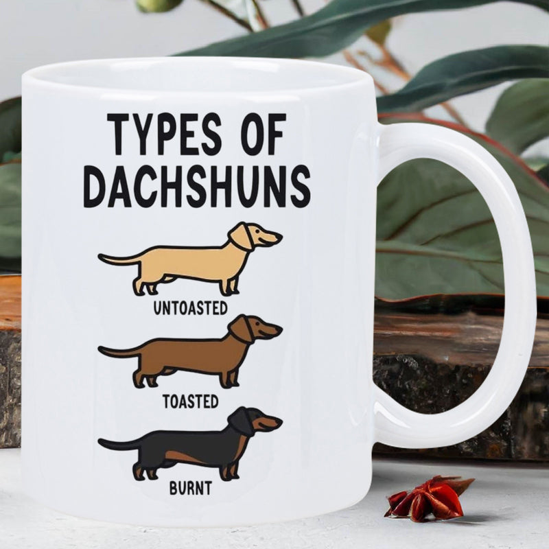 Tailorly White Ceramic 11 oz Mug - Types Of Dachshuns Untoasted Toasted Burnt Three Minimalist Cartoon Wiener Dogs Standing In Horizontal Rows With Different Fur