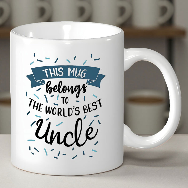 Tailorly White Ceramic 11 oz Mug - This Mug Belongs To The World's Best Uncle Elegant Featuring Blue Ribbon And Confetti Style Sprinkles Mug