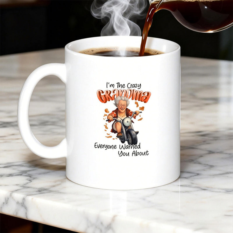 Tailorly White Ceramic 11 oz Mug - I'm The Crazy Grandma Everyone Warned You About Cool Senior Lady Riding A Powerful Motorcycle Amidst Swirling Autumn Leaves