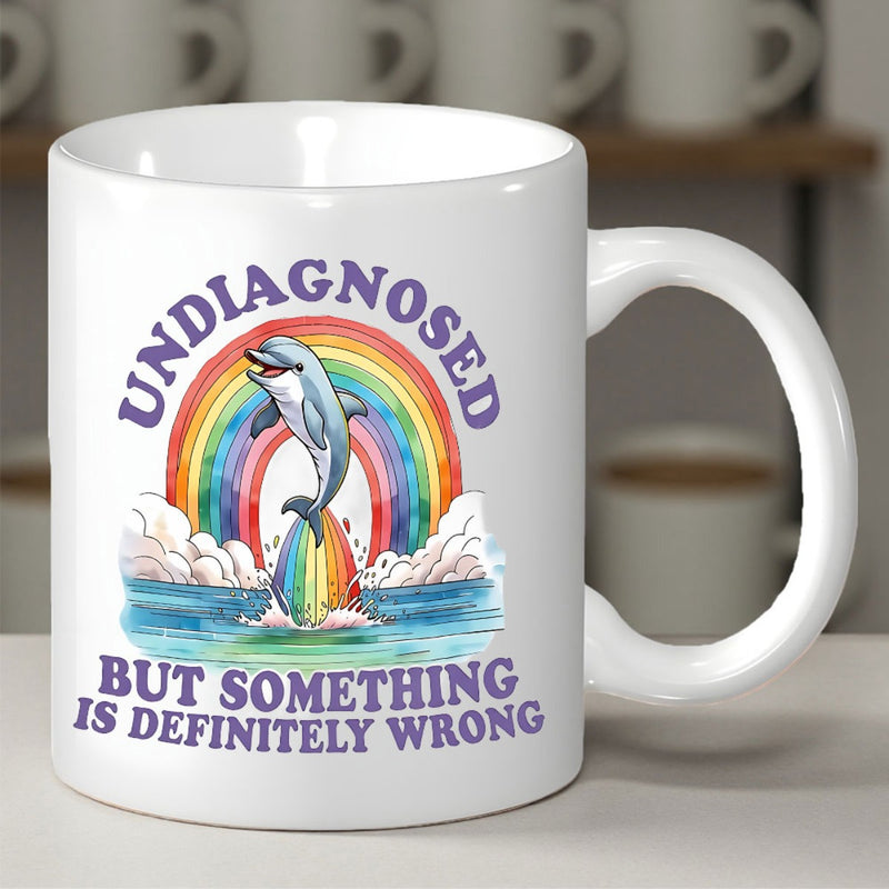 Tailorly White Ceramic 11 oz Mug - Undiagnosed But Something Is Definitely Wrong Vibrant Colorful Rainbow Arching Over Ocean Waves With Fluffy Clouds And Jumping