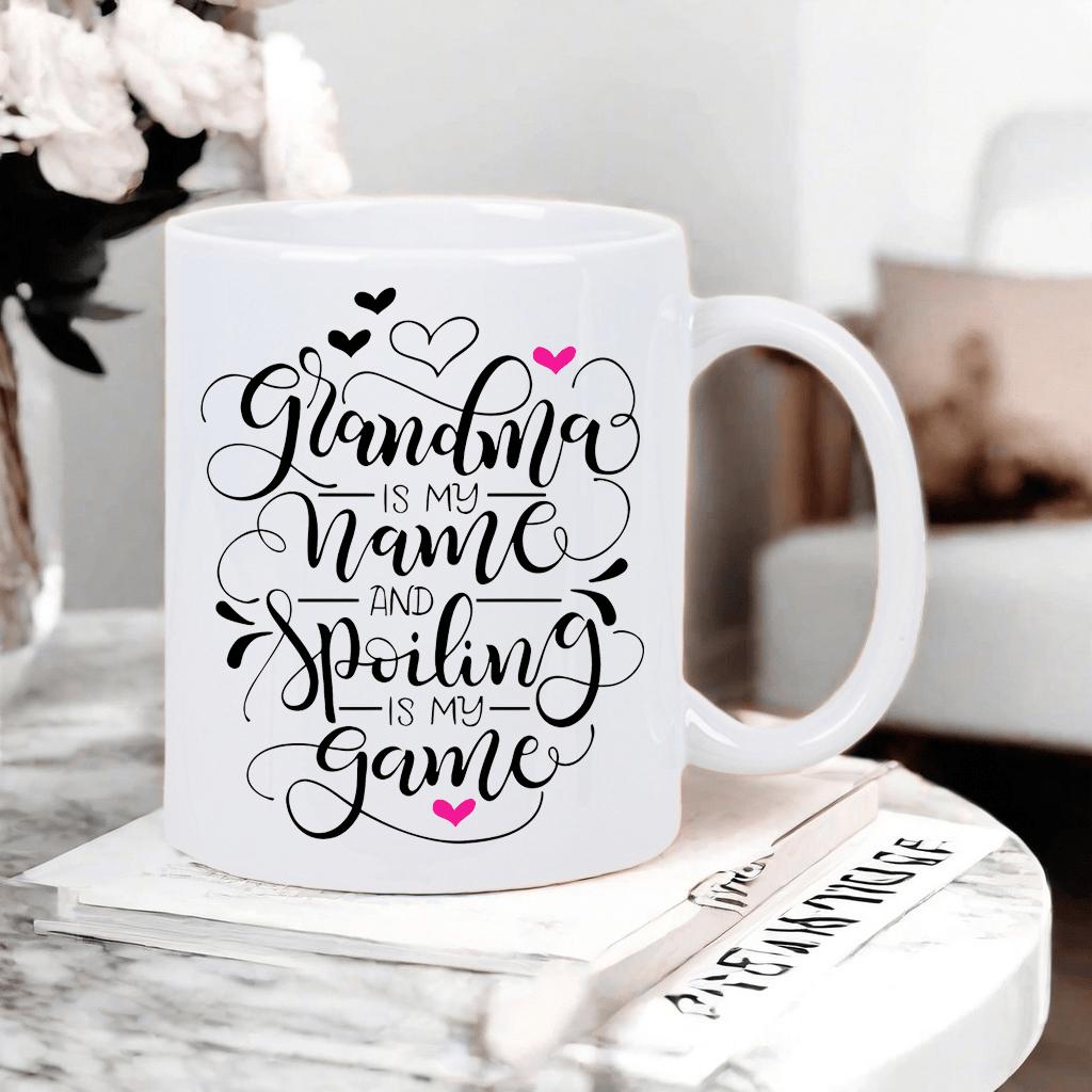Tailorly White Ceramic 11 oz Mug - Grandma Is My Name And Spoiling Is My Game Elegant Script Lettering Decorated With Small Black And Pink Hearts Mug
