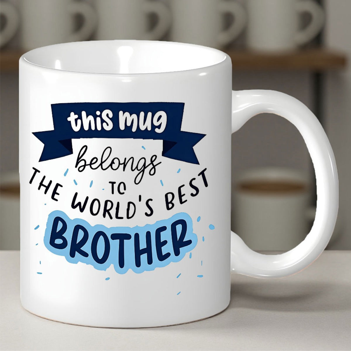 Tailorly White Ceramic 11 oz Mug - This Mug Belongs To The World's Best Brother Stylized Blue Ribbon Featuring Elegant Script Typography Among Playful Confetti