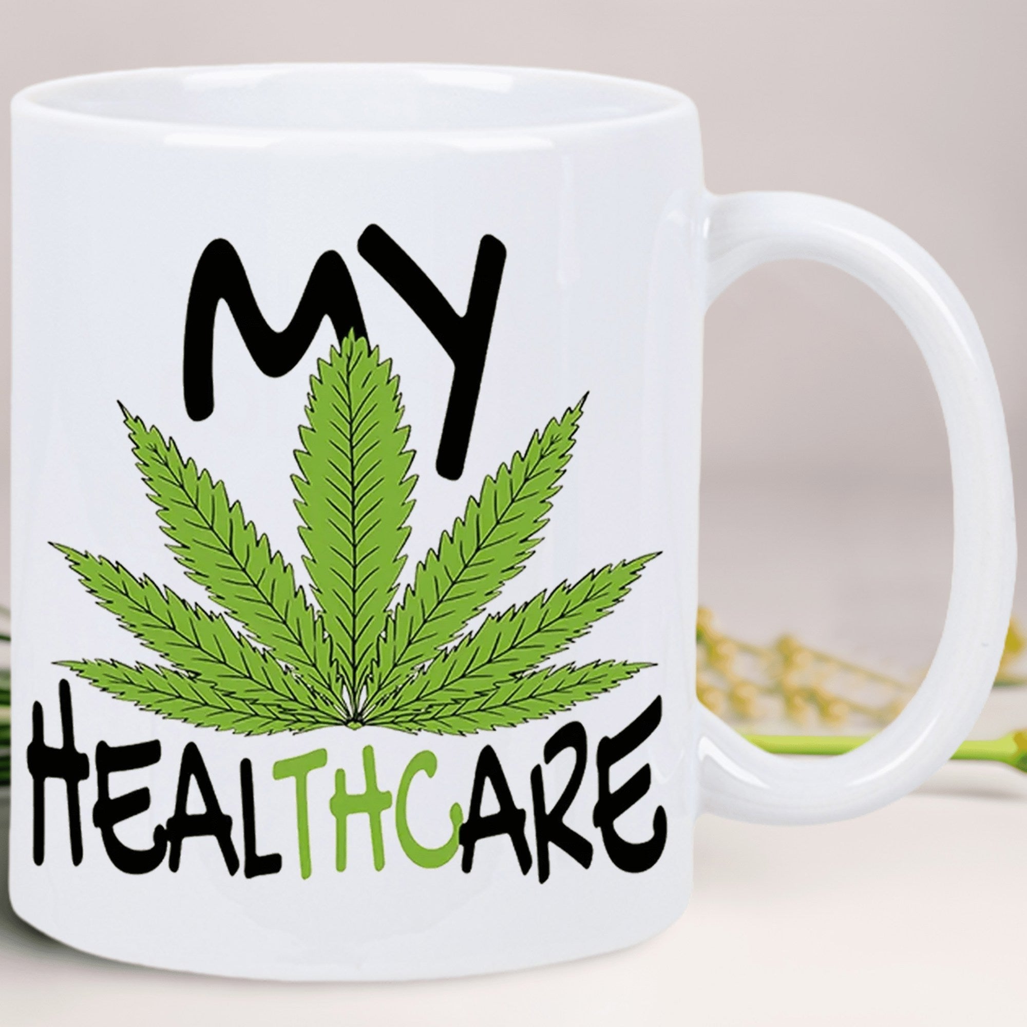 Tailorly White Ceramic 11 oz Mug - My Healthcare Vibrant Green Serrated Cannabis Leaf Positioned Between Bold Stylized Typography Leaf