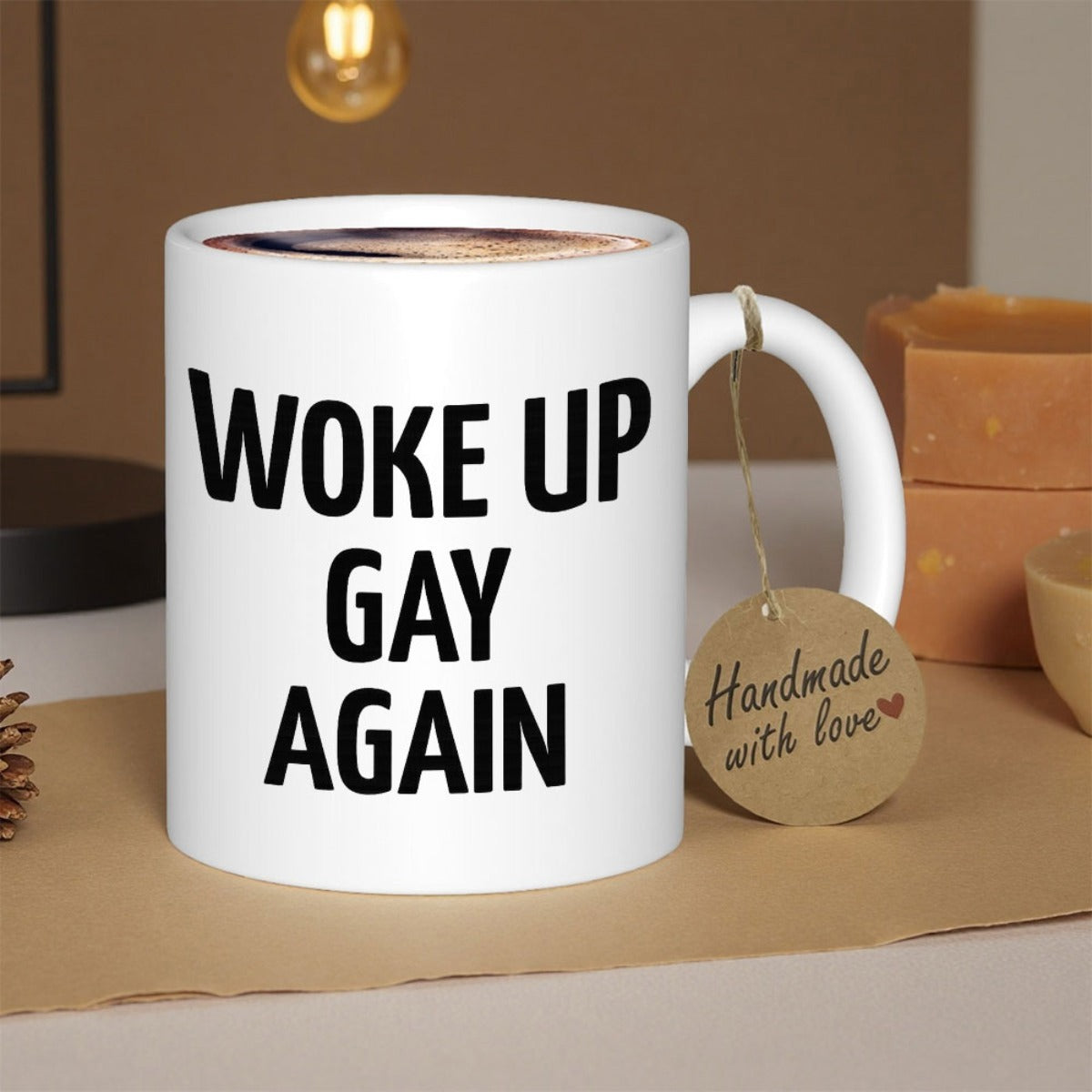Tailorly White Ceramic 11 oz Mug - Woke Up Gay Again Minimalist White Ceramic Coffee Cup Sitting On Wooden Surface Mug