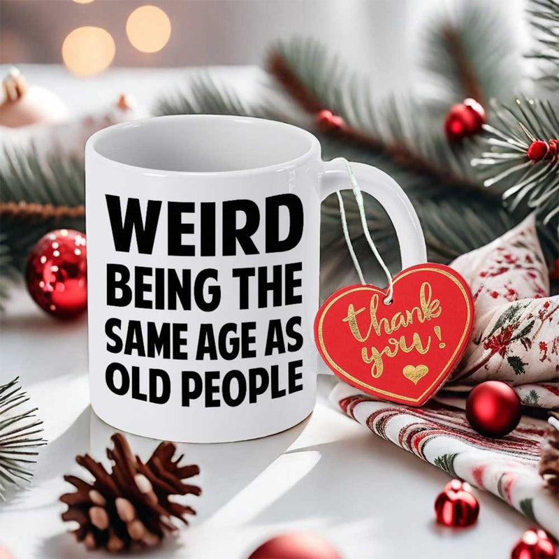 Tailorly White Ceramic 11 oz Mug - Weird Being The Same Age As Old People Thank You Festive Holiday Background With Ornaments And Pine Cones Mug