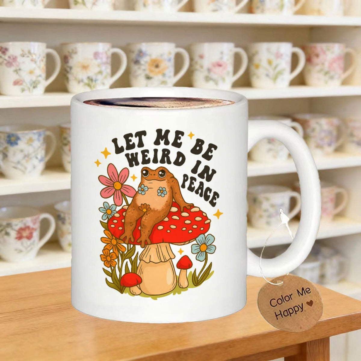 Tailorly White Ceramic 11 oz Mug - Let Me Be Weird In Peace Whimsical Brown Frog Resting On Red Spotted Mushroom Surrounded By Vibrant Flowers Frog
