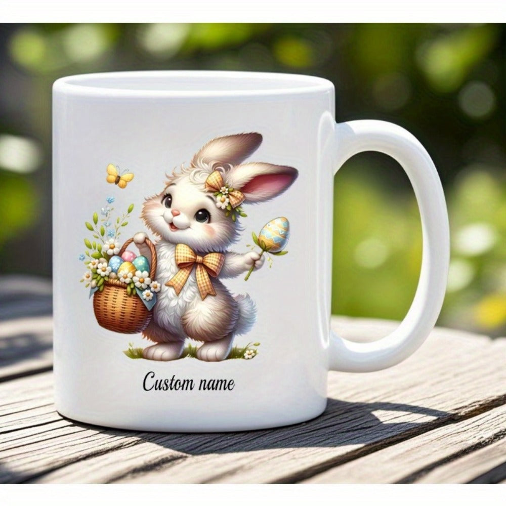 Tailorly White Ceramic 11 oz Mug - Custom Name Adorable Fluffy Bunny Carrying Wicker Basket Filled With Colorful Easter Eggs Rabbit