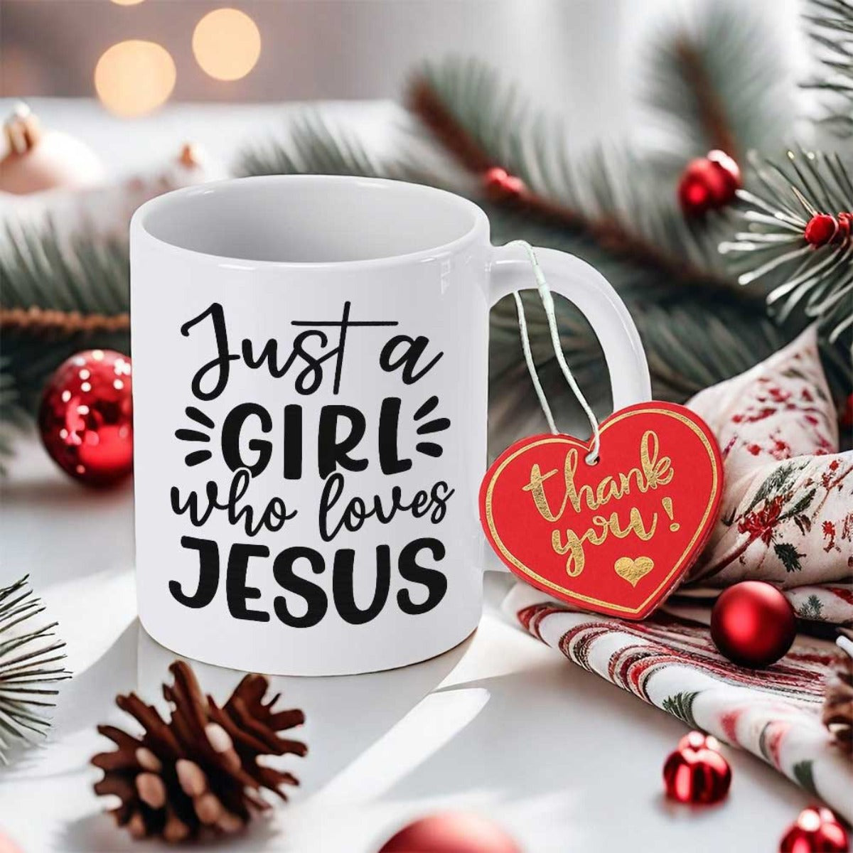 Tailorly White Ceramic 11 oz Mug - Just A Girl Who Loves Jesus Thank You Elegant White Ceramic Vessel Resting Among Holiday Ornaments Mug