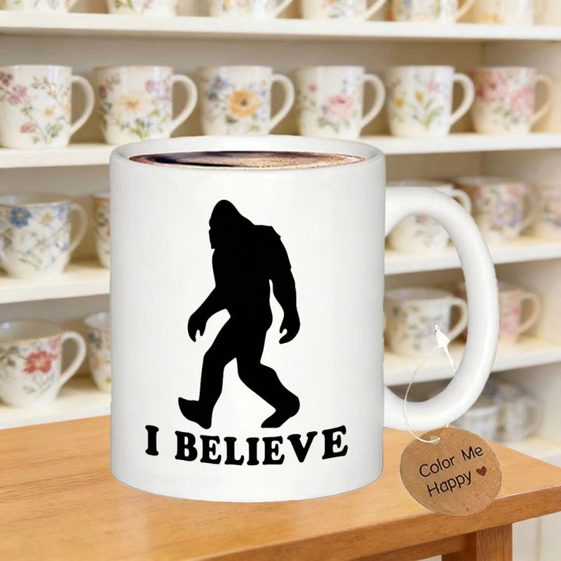 Tailorly White Ceramic 11 oz Mug - I Believe Walking Hairy Cryptid Silhouette Against A Plain White Minimalist Background Bigfoot