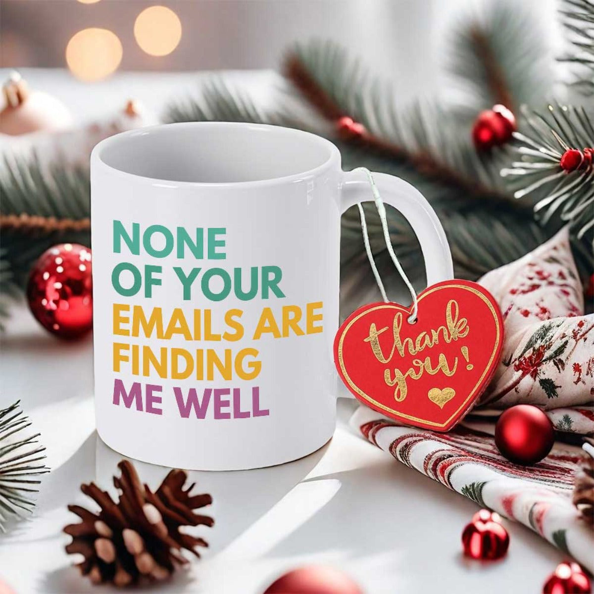 Tailorly White Ceramic 11 oz Mug - None Of Your Emails Are Finding Me Well Festive Christmas Arrangement With Holiday Decorations And Pine Branches On Table Mug