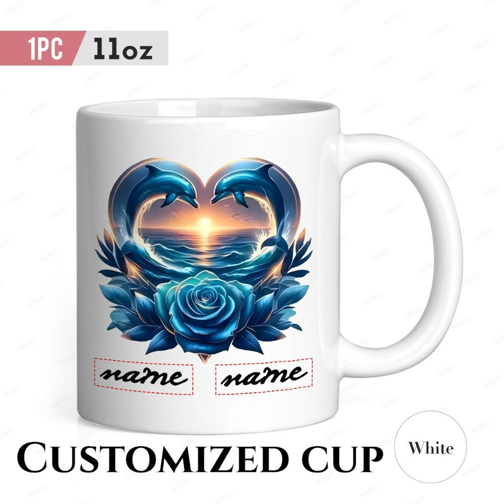 Tailorly White Ceramic 11 oz Mug - Name Name Elegant Blue Dolphins Forming Heart Shape Above Ocean Sunset Radiant Rose Dolphin