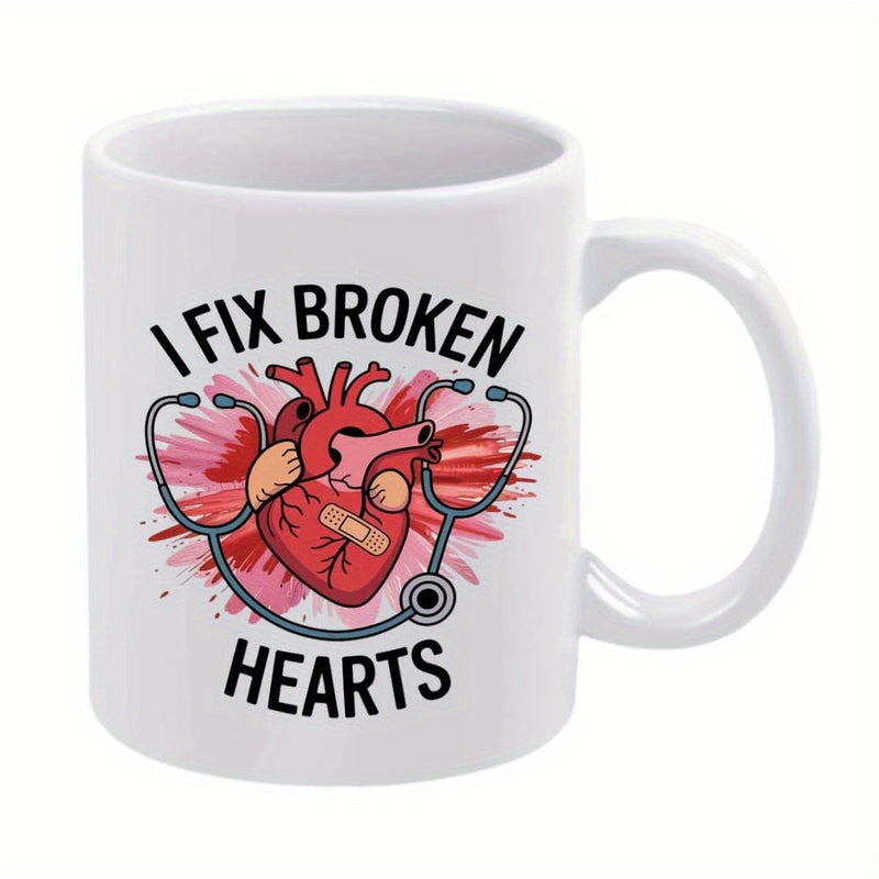 Tailorly White Ceramic 11 oz Mug - I Fix Broken Hearts Anatomical Heart Wrapped In Stethoscope With Bandage Over Pink Splatter Heart