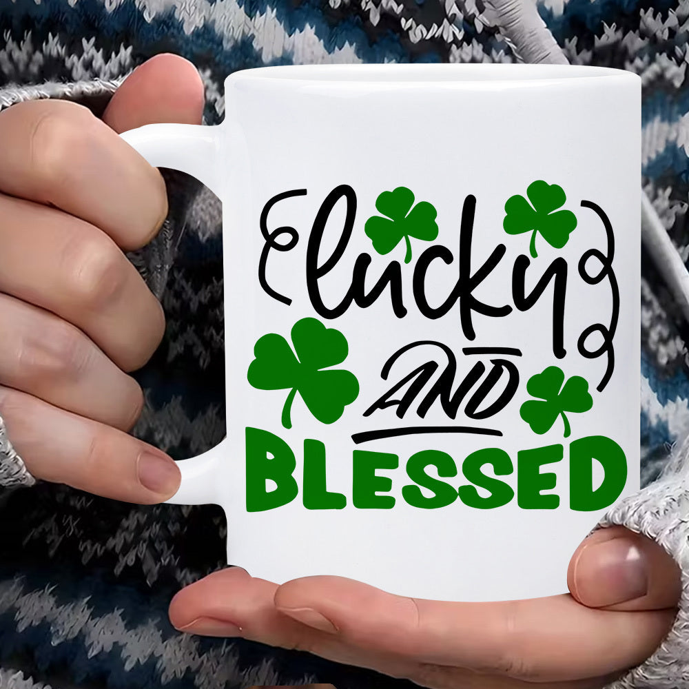 Tailorly White Ceramic 11 oz Mug - Lucky And Blessed Vibrant Green Shamrock Leaves With Artistic Black Swirls And Bold Typography Clover