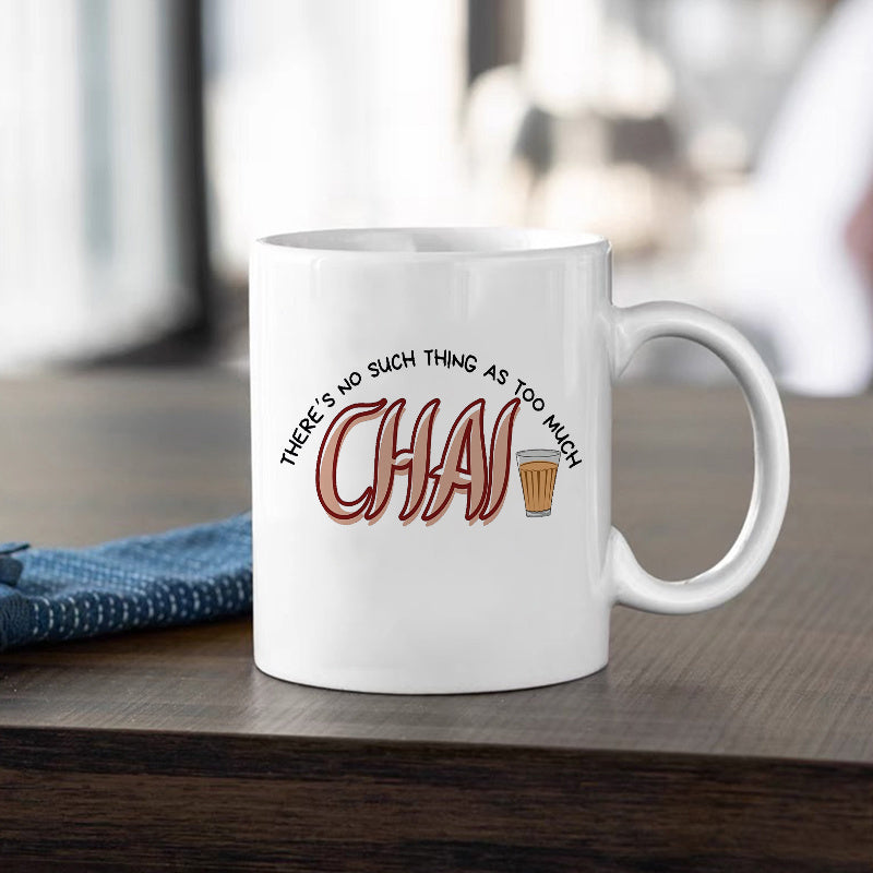 Tailorly White Ceramic 11 oz Mug - There Is No Such Thing As Too Much Chai Warm Brown Stylized Lettering Next To A Small Glass Of Tea Mug