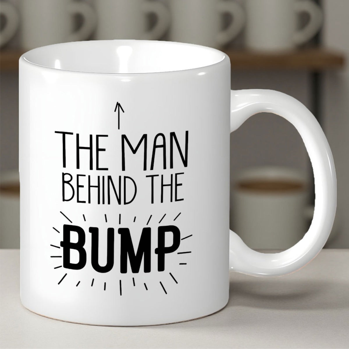 Tailorly White Ceramic 11 oz Mug - The Man Behind The Bump Minimalist Black Lettering With Upward Arrow And Radiating Lines Accents Mug