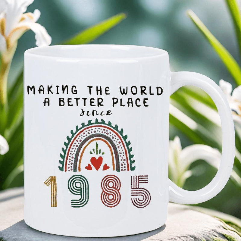 Tailorly White Ceramic 11 oz Mug - Making The World A Better Place Since 1985 Decorative Earthy Tones Boho Style With Hearts And Retro Numbers Rainbow