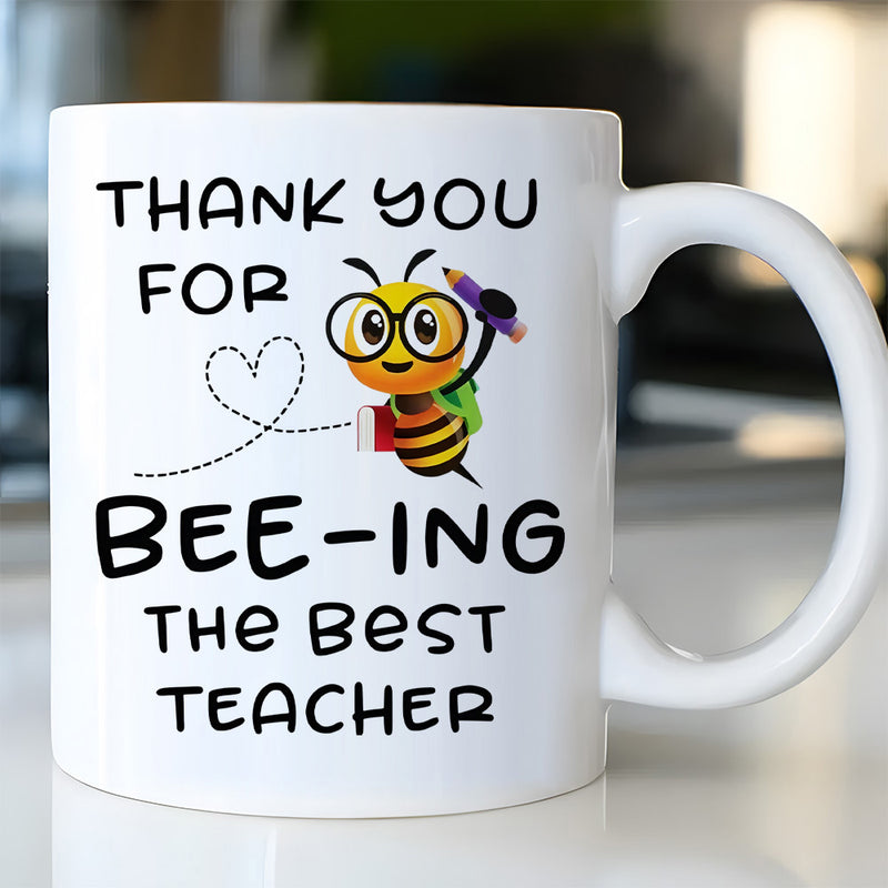 Tailorly White Ceramic 11 oz Mug - Thank You For Bee-ing The Best Teacher Cute Cartoon Bee Wearing Glasses Holding A Pencil And Backpack Bee