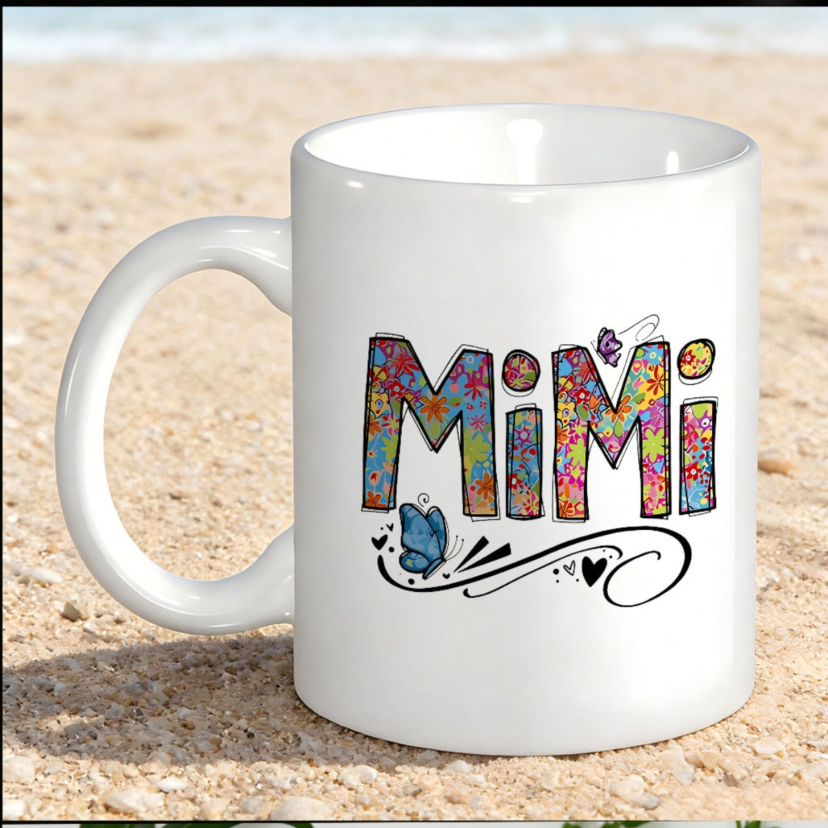 Tailorly White Ceramic 11 oz Mug - MiMi Colorful Floral Pattern Inside Letters Among Hearts And Flying Butterfly