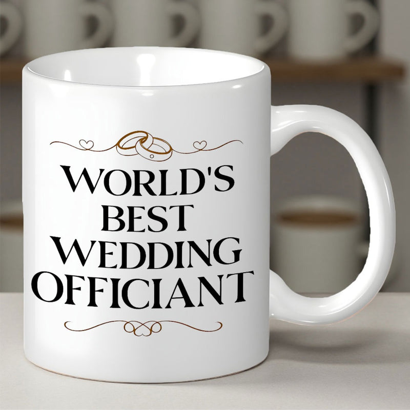 Tailorly White Ceramic 11 oz Mug - Worlds Best Wedding Officiant Elegant Interlocking Golden Rings With Decorative Swirls And Heart Accents Mug