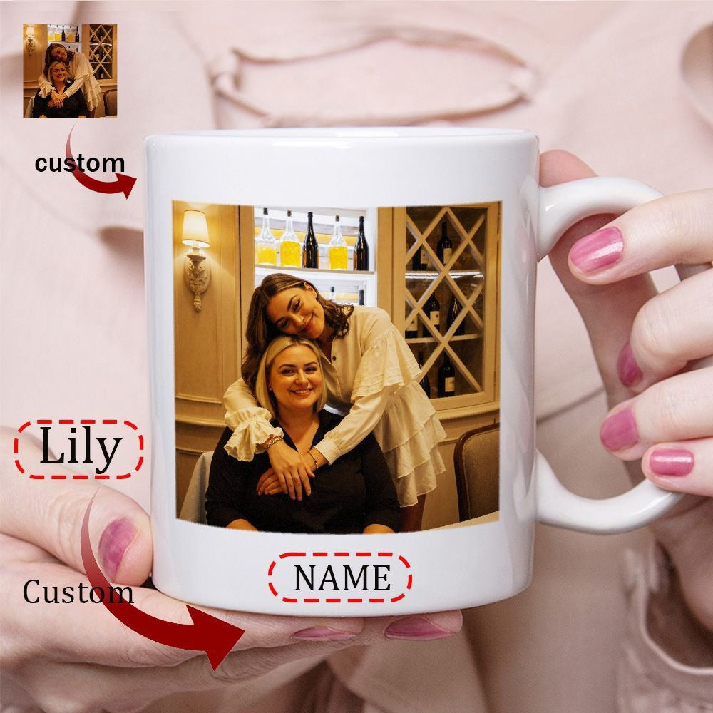 Tailorly White Ceramic 11 oz Mug - Lily Custom Name Two Smiling Women Embracing Warmly Inside A Cozy Indoor Restaurant Scene Mug