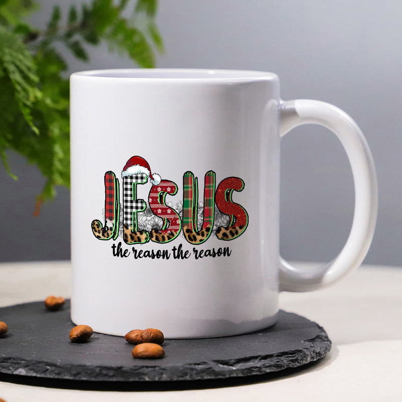 Tailorly White Ceramic 11 oz Mug - Jesus The Reason Festive Plaid And Leopard Patterned Letters Wearing A Red Santa Hat Jesus