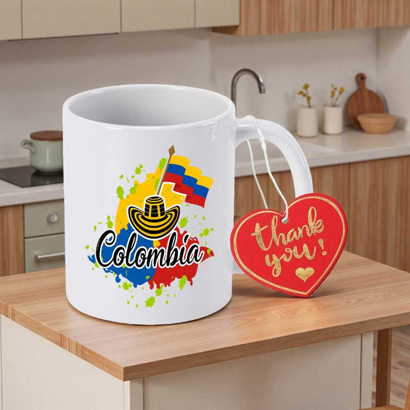 Tailorly White Ceramic 11 oz Mug - Colombia Traditional Cultural Hat With Colorful Splatters Behind A Waving National Flag