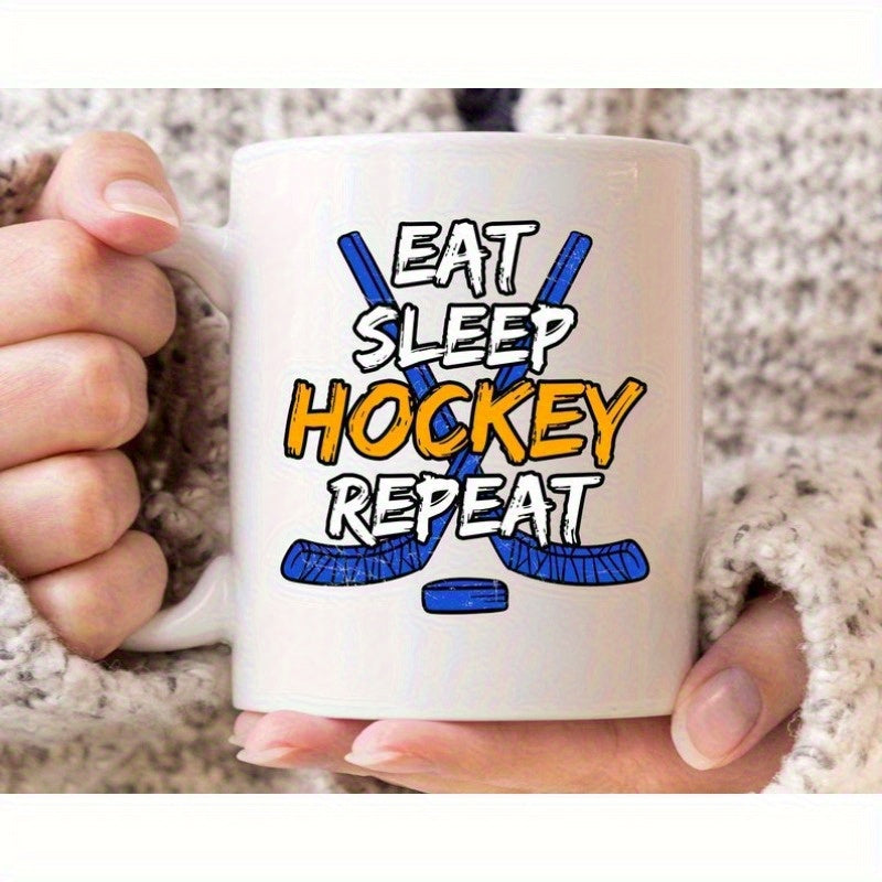 Tailorly White Ceramic 11 oz Mug - Eat Sleep Hockey Repeat Two Crossed Blue Hockey Sticks With Small Matching Puck Below Hockey