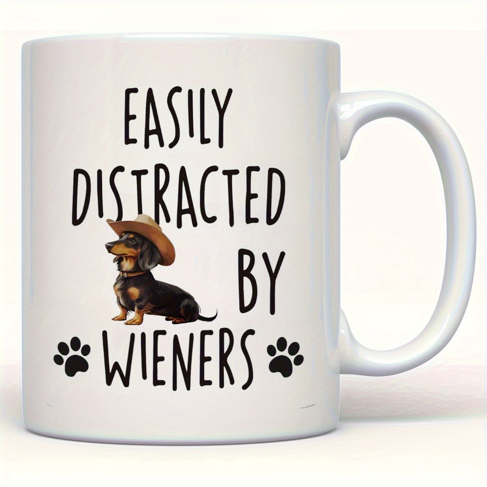 Tailorly White Ceramic 11 oz Mug - Easily Distracted By Wieners Sitting Dog Wearing A Brown Cowboy Hat Beside Tiny Black Paw Prints Dachshund