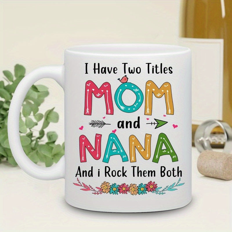 Tailorly White Ceramic 11 oz Mug - I Have Two Titles Mom And Nana And I Rock Them Both Vibrant Playful Letters Surrounded By Small Hearts And Delicate Spring Flora