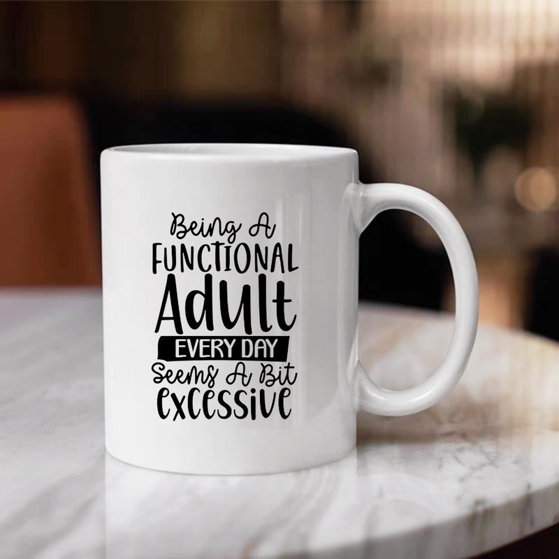 Tailorly White Ceramic 11 oz Mug - Being A Functional Adult Every Day Seems A Bit Excessive Polished White Ceramic Vessel Featuring Bold Black Typography And